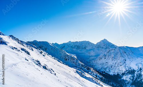 Fototapeta Naklejka Na Ścianę i Meble -  Poland 2022. Beautiful view on the snow Tatry. Zakopane, Giewont, Kasprowy Wierch, Swinica, Rysy, Kresanica.