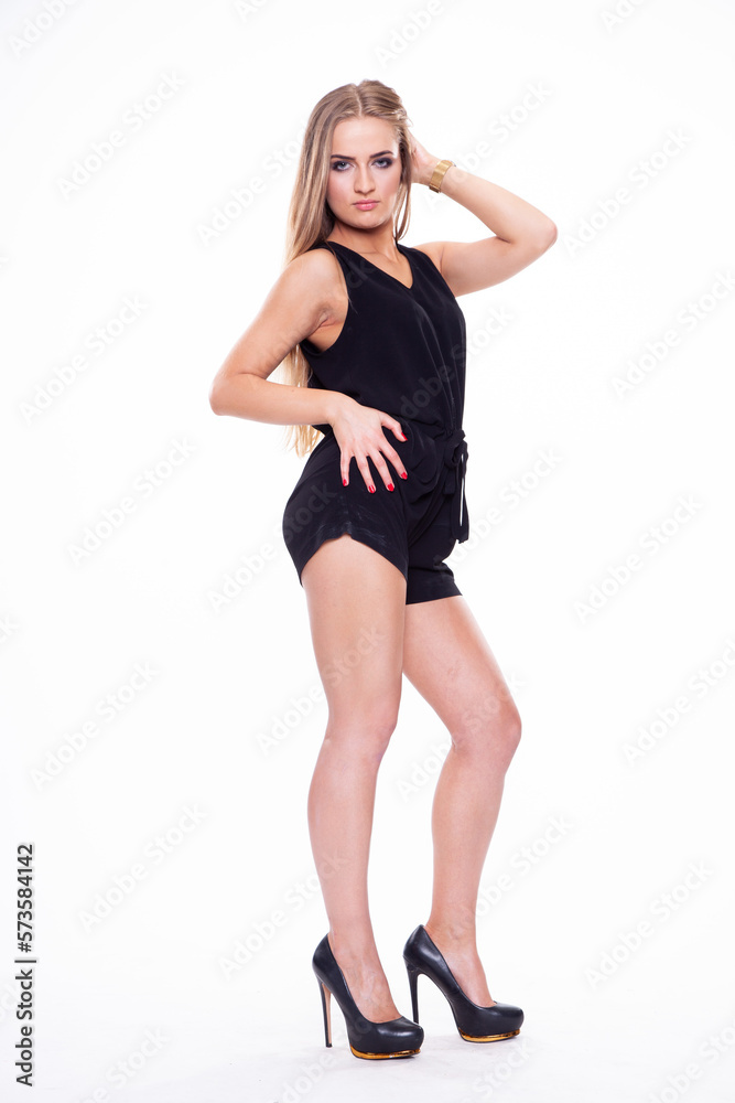 figure of a beauty young blonde hair dancer posing in black dress isolated on white background figure of a beauty young blonde hair dancer posing in black dress isolated on white background