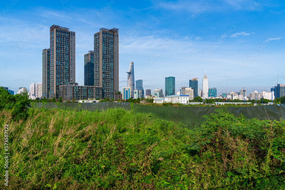Fototapeta premium Beautiful morning in Ho Chi Minh City, one of the most developed cities in Vietnam. With many famous buildings and towers such as Bitexco, Landmark 81,....
