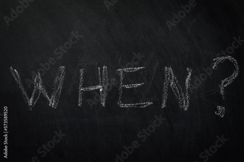 When ? The word when written in chalk on a blackboard - one of the essential questions in journalism and communication