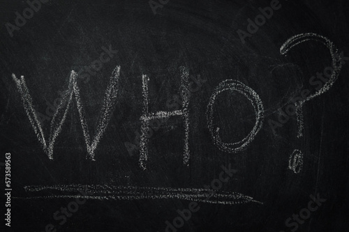 Who ? The word who written in chalk on a blackboard - one of the essential questions in journalism and communication