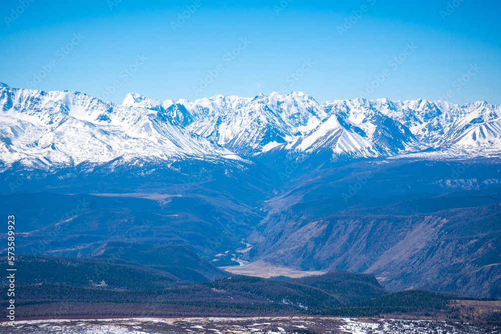 View from a repeater on snowy tops of Altai mountains near Aktash town, Russia