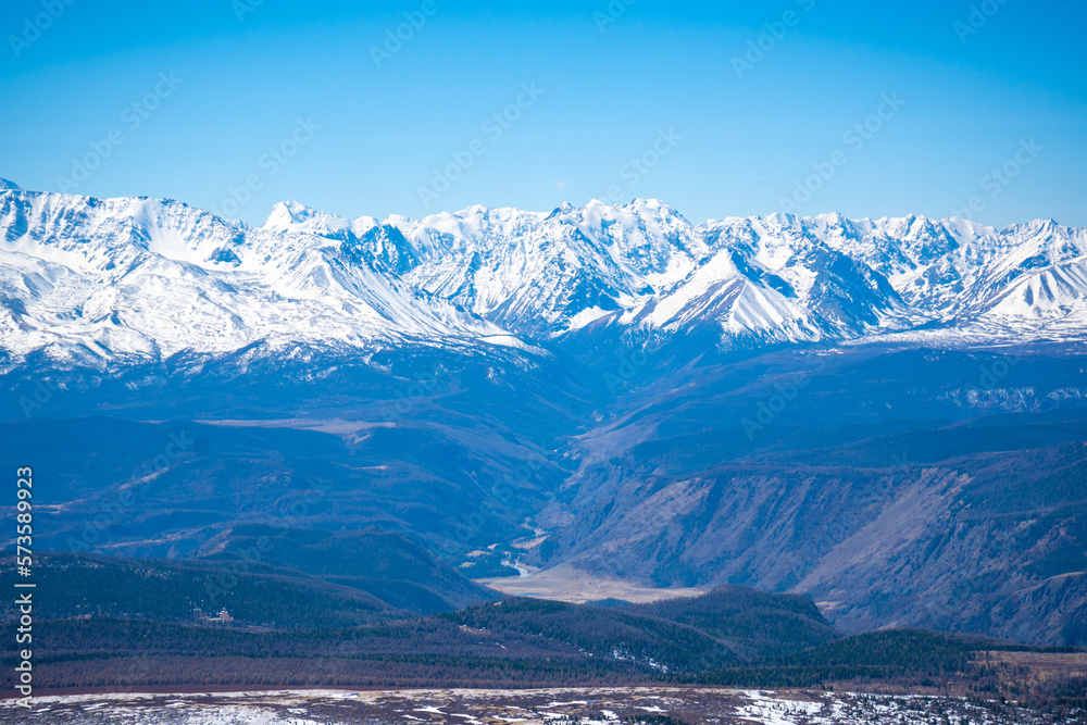 View from a repeater on snowy tops of Altai mountains near Aktash town, Russia View from a repeater on snowy tops of Altai mountains near Aktash town, Russia
