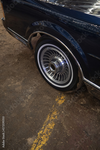 Photograph of an old car wheel. Auto background