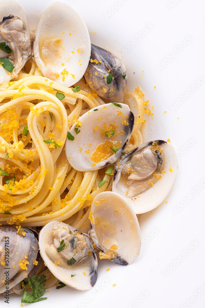 Spaghetti pasta with clams (vongole) and bottarga (dried tuna or mullet