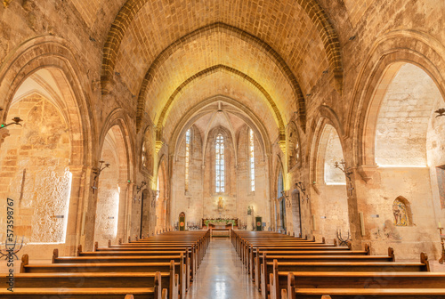 VALENCIA, SPAIN - FEBRUARY 17, 2022: The gothic nave of church Iglesia San Juan de Ospital. photo