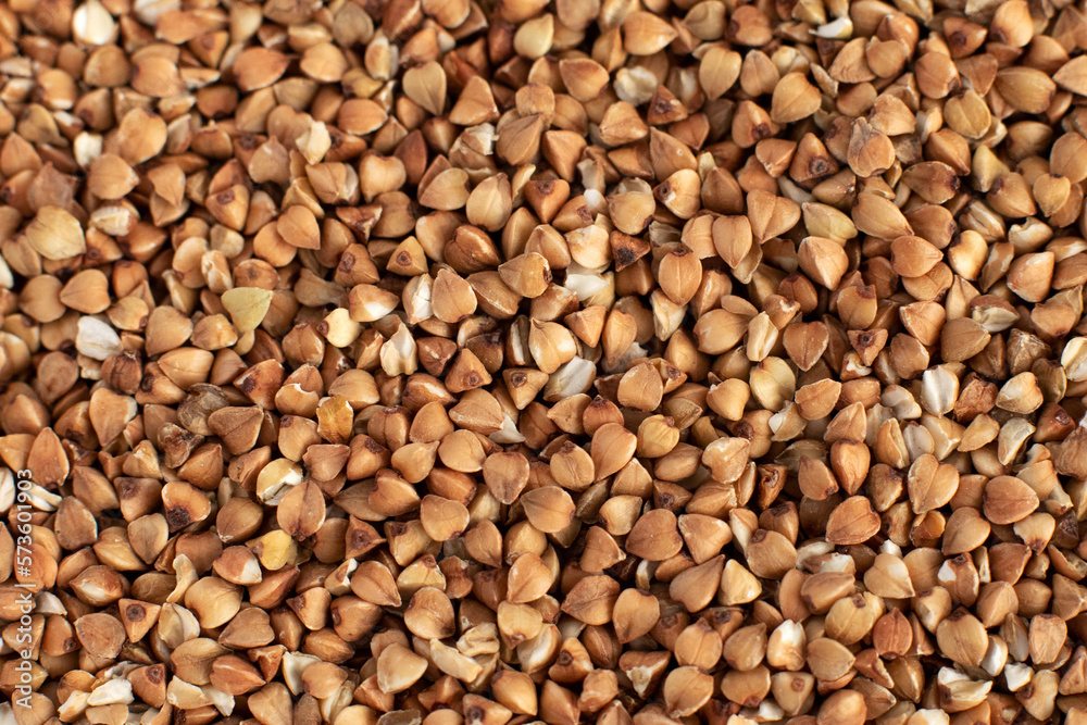 Buckwheat groats top view, a bunch of useful cereals Buckwheat groats top view, a bunch of useful cereals