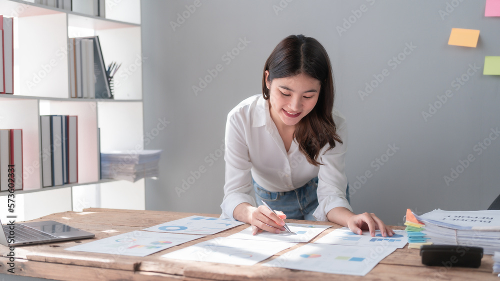 Hard working of asian people bookkeepers working with balance sheet and taxation, company quarterly reports of accounting and marketing. Hard working of asian people bookkeepers working with balance sheet and taxation, company quarterly reports of accounting and marketing.