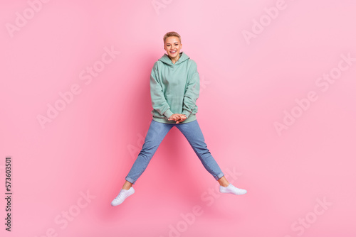 Full length photo of cheerful lovely lady wear trendy clothes celebrate victory win lottery isolated on pink color background