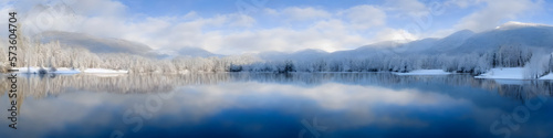 Scenic landscape of snow-covered mountains and a crystal lake. Generative AI. © Alexander