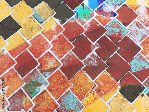 Snow on Colorful Paving Tiles. Multicolor Pavement.