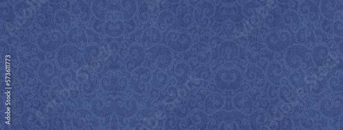 Cardboard background with an embossed floral pattern. Elegant background in blue tones
