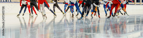 mass start men skater in speed skating competition photo