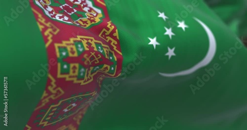 Detail of the Turkmenistan national flag waving in the wind photo