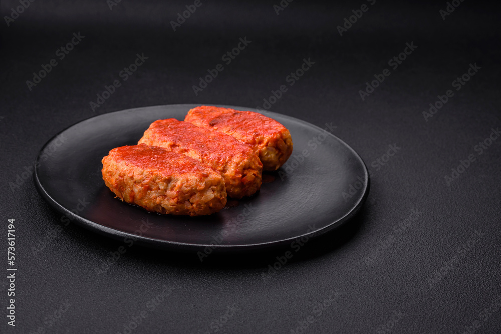Meat cutlet or meatballs in tomato sauce with garlic, salt, spices and herbs Meat cutlet or meatballs in tomato sauce with garlic, salt, spices and herbs