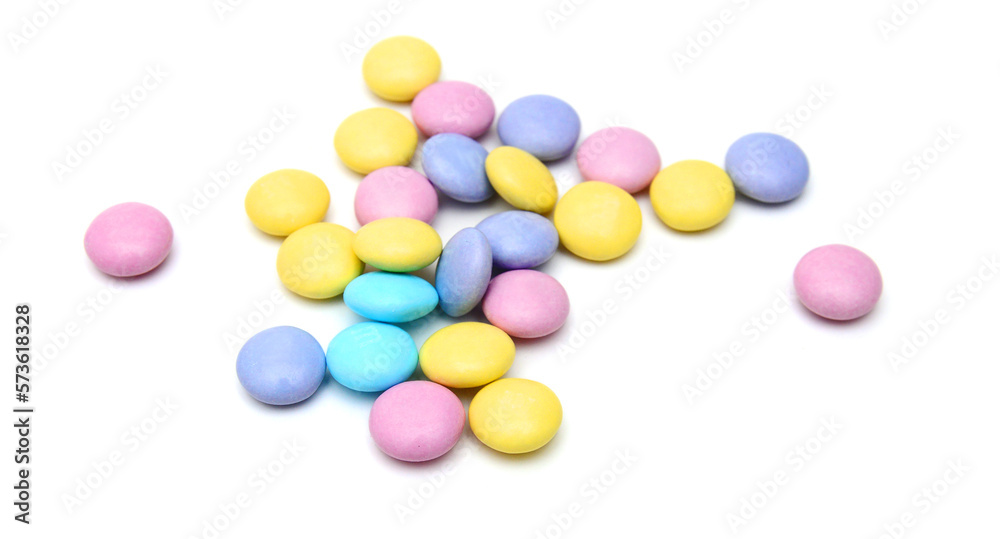 Closeup of colorful chocolate candies on white 