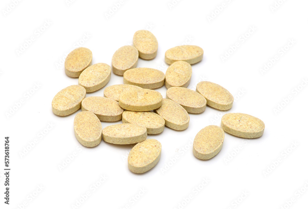 Brown pills, medicine isolated on white background, top view Brown pills, medicine isolated on white background, top view