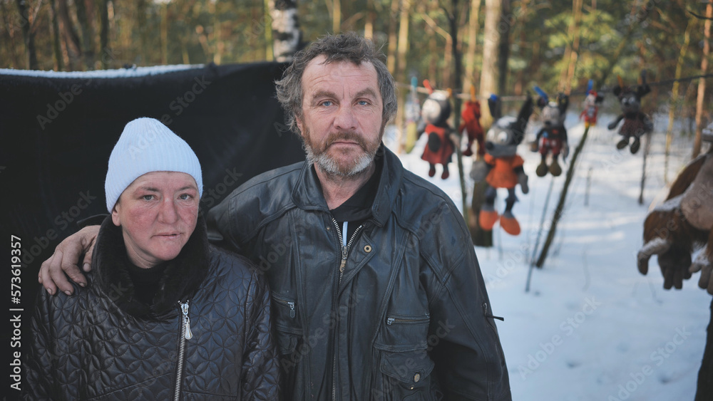 Homeless people are interviewed in the winter in the woods. Homeless people are interviewed in the winter in the woods.