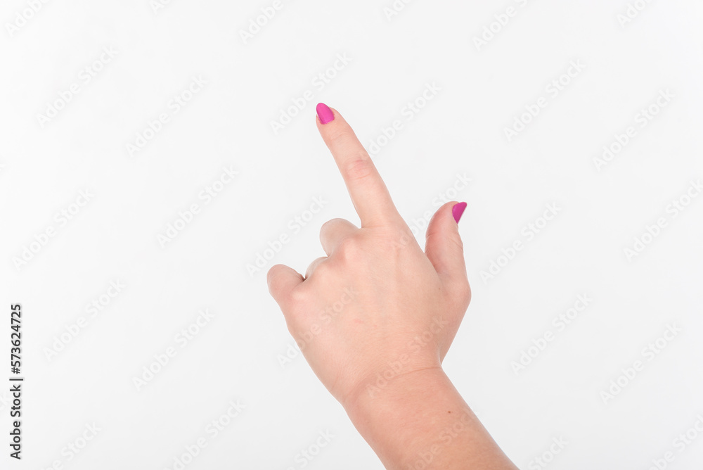 Woman Hand with Polish Fingers on White Background. Shows Sign And Gesture Towards. Touch The Screen Woman Hand with Polish Fingers on White Background. Shows Sign And Gesture Towards. Touch The Screen