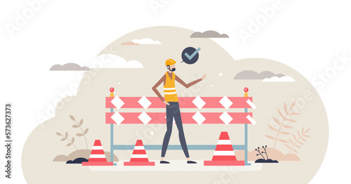 Construction safety and personal protection equipment tiny person concept, transparent background. Road repair site risk prevention with striped lines, helmet and vest.