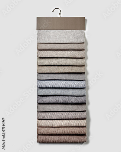 Collection of natural upholstery fabric samples for furniture design