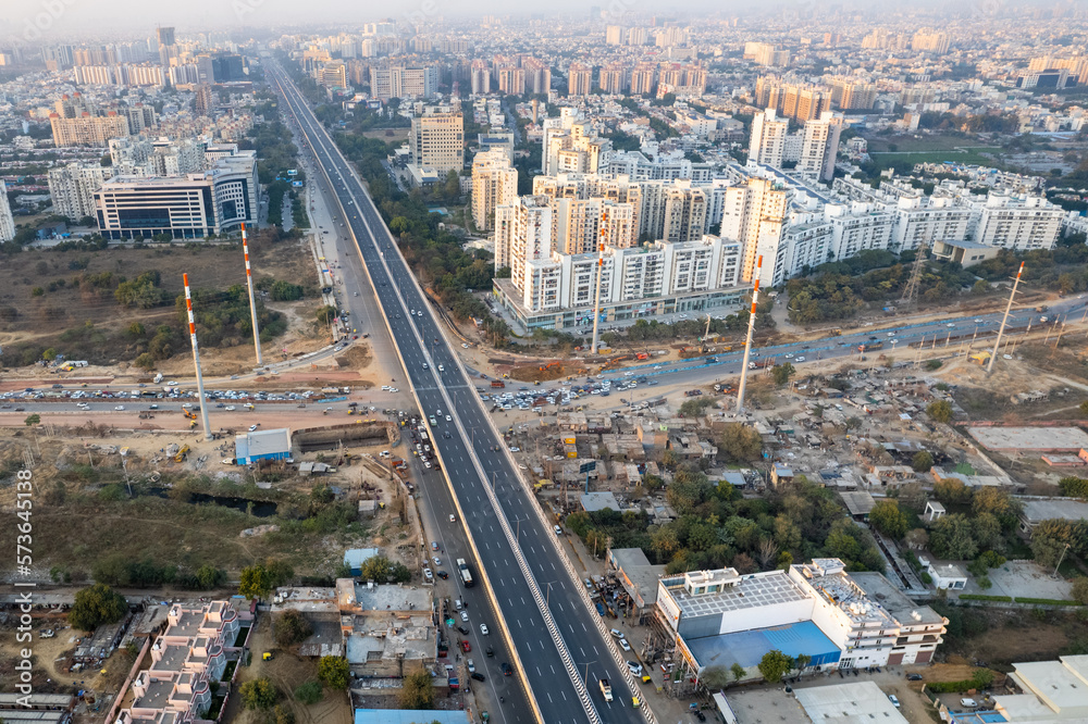 aerial drone still shot showing busy sohna elevated highway toll road with traffic stuck at interesction due to road construction of bridge or underpass