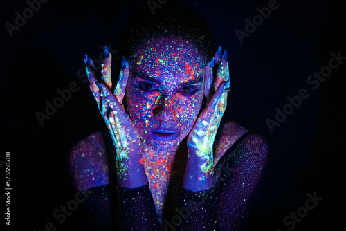 Quadro su tela Portrait of a beautiful woman with blue sequins on her face