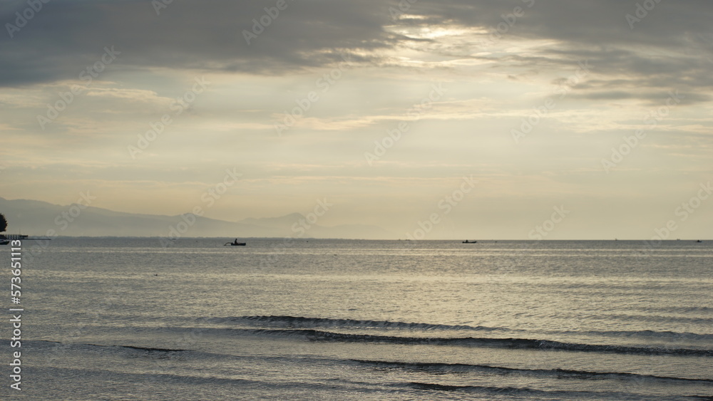 Fototapeta premium Panoramic beach landscape. Empty tropical beach and seascape. Orange and golden sunset sky, soft sand, calmness, tranquil relaxing sunlight