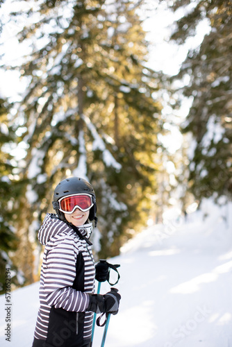 Young woman enjoing Winter Day of Skiing Fun in the Snow © BGStock72