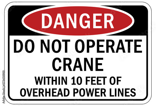 Overhead crane hazard sign and labels do not operate crane within 10 feet of overhead power lines