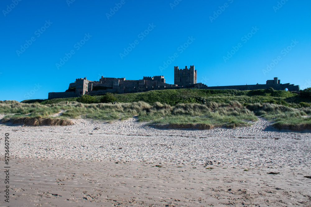 Bamburgh Castle on a hot summer's day in 2022. Northumberland, UK