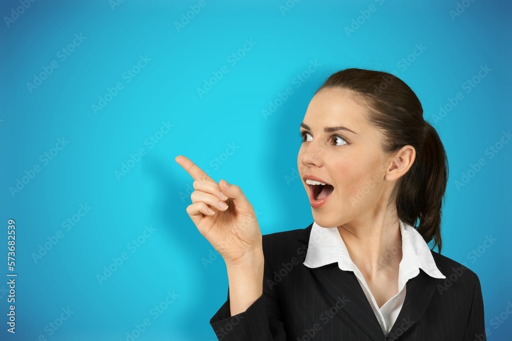 Happy young beautiful woman fingers pointing Happy young beautiful woman fingers pointing