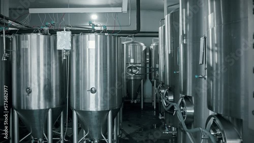 workshop of modern brewery, cylindrically-conical fermenter for fermenting beer