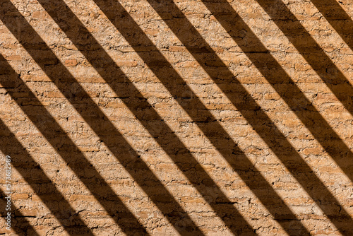 Patterns in brick walls of mood in El Badi Palace, Marrakech, Morocco