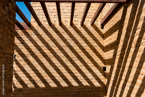 Patterns in brick walls of mood in El Badi Palace, Marrakech, Morocco