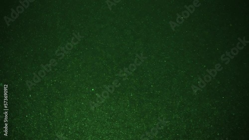 Fine green dust particles behave like snow during a blizzard photo