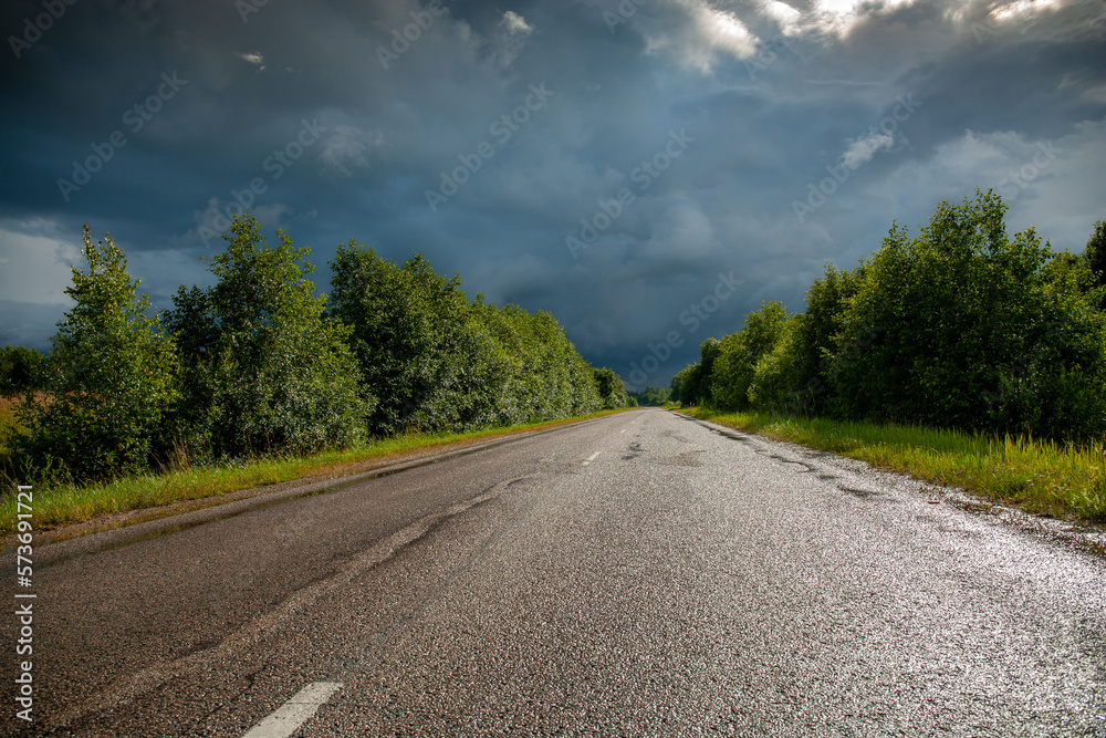 Fototapeta premium road after rain in the countryside