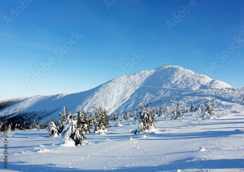 The peak of the Snezka Mountain in the Krkonose Mountains during winter on a sunny day. Poland, Europe © KatuSka