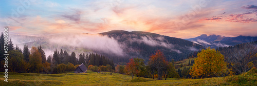 Misty early daybreak in autumn Carpathian mountain  Ukraine.