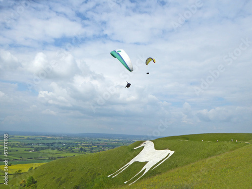 Paragliders flying at Westbury in Wiltshire	 photo