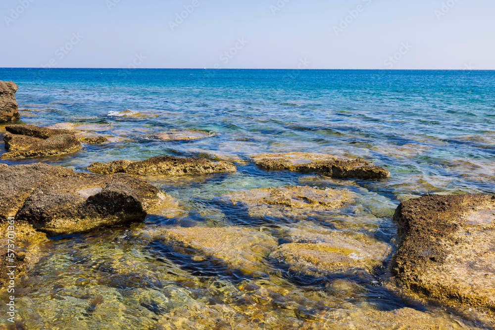 Gorgeous view of rocky coast of Mediterranean Sea in summer day. Greece. Gorgeous view of rocky coast of Mediterranean Sea in summer day. Greece.