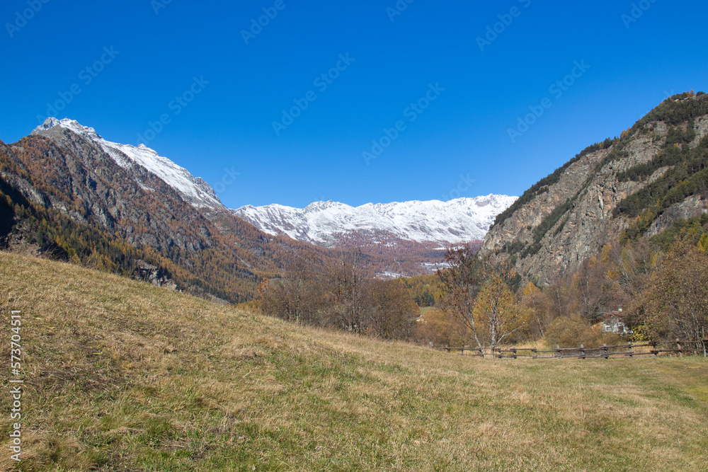 Around Brusson lake in autumn. Ayas valley, Italy. Around Brusson lake in autumn. Ayas valley, Italy.