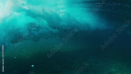 Wallpaper Mural Girl surfer rides the wave. Woman surfs the ocean wave in the Maldives Torontodigital.ca