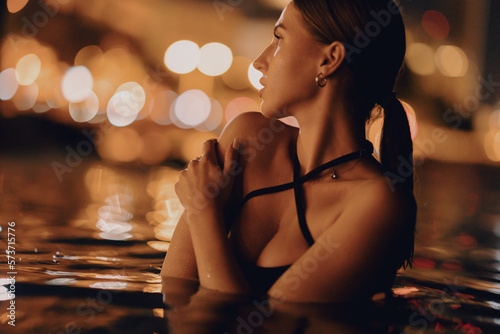 sexy girl at night on the sea