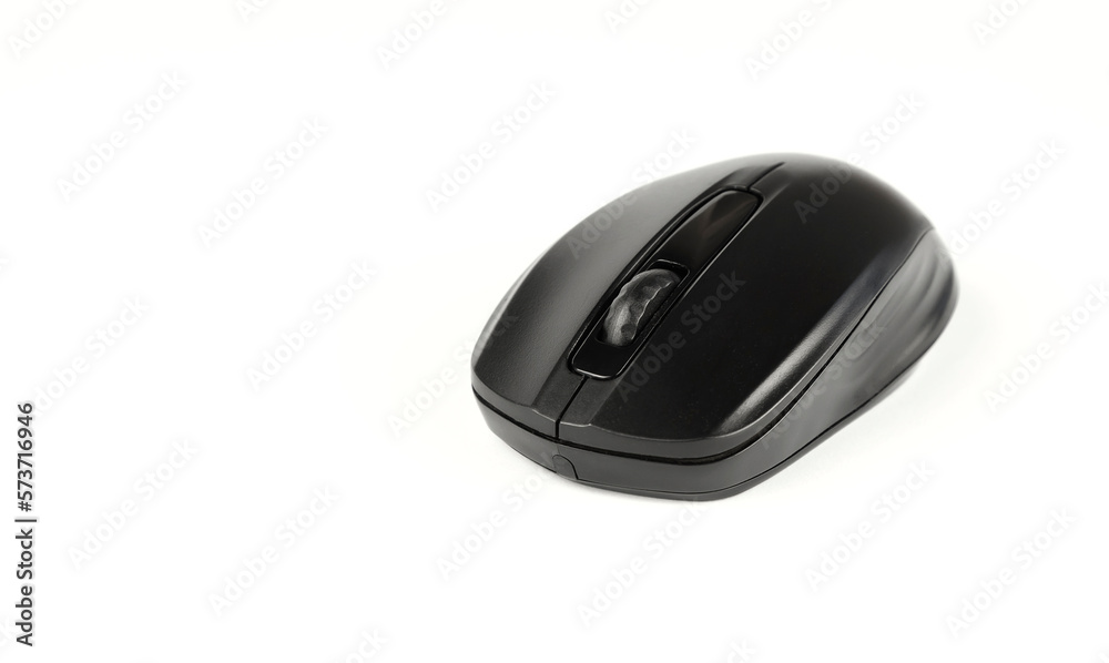 Black wireless computer mouse on a white background. Black wireless computer mouse on a white background.
