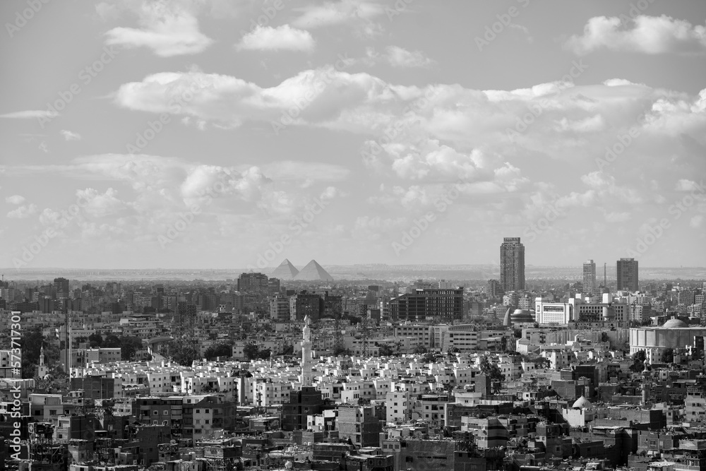 Black and white Photo of the Cairo Skyline with the Pyramids in the Background
