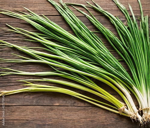 fresh green onion on wooden background