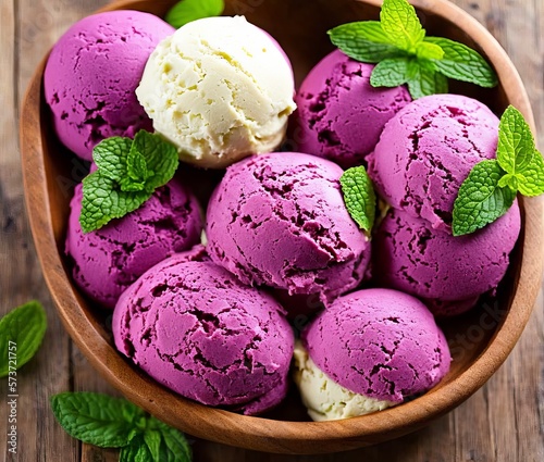 delicious ice cream scoops with fresh berries on grey background