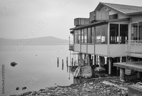 stilt house used as a tourist restaurant on the Viverone Lake shores; small lake of glacial origin, is located in Northern Italy, Piedmont Region.