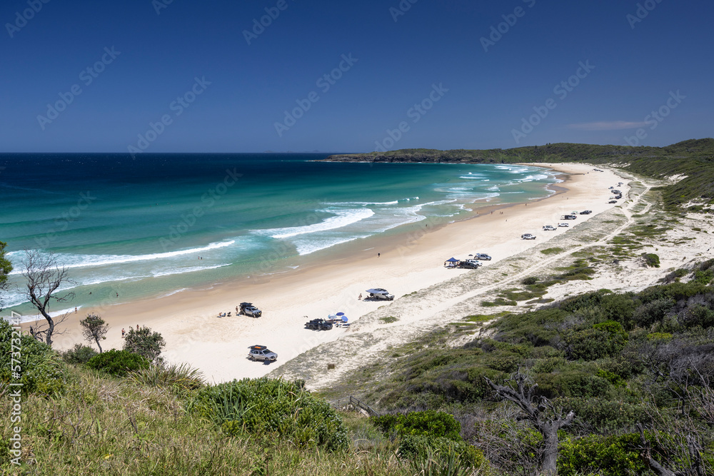 Vehicles parked on Lighthouse Beach, Seal Rocks Australia